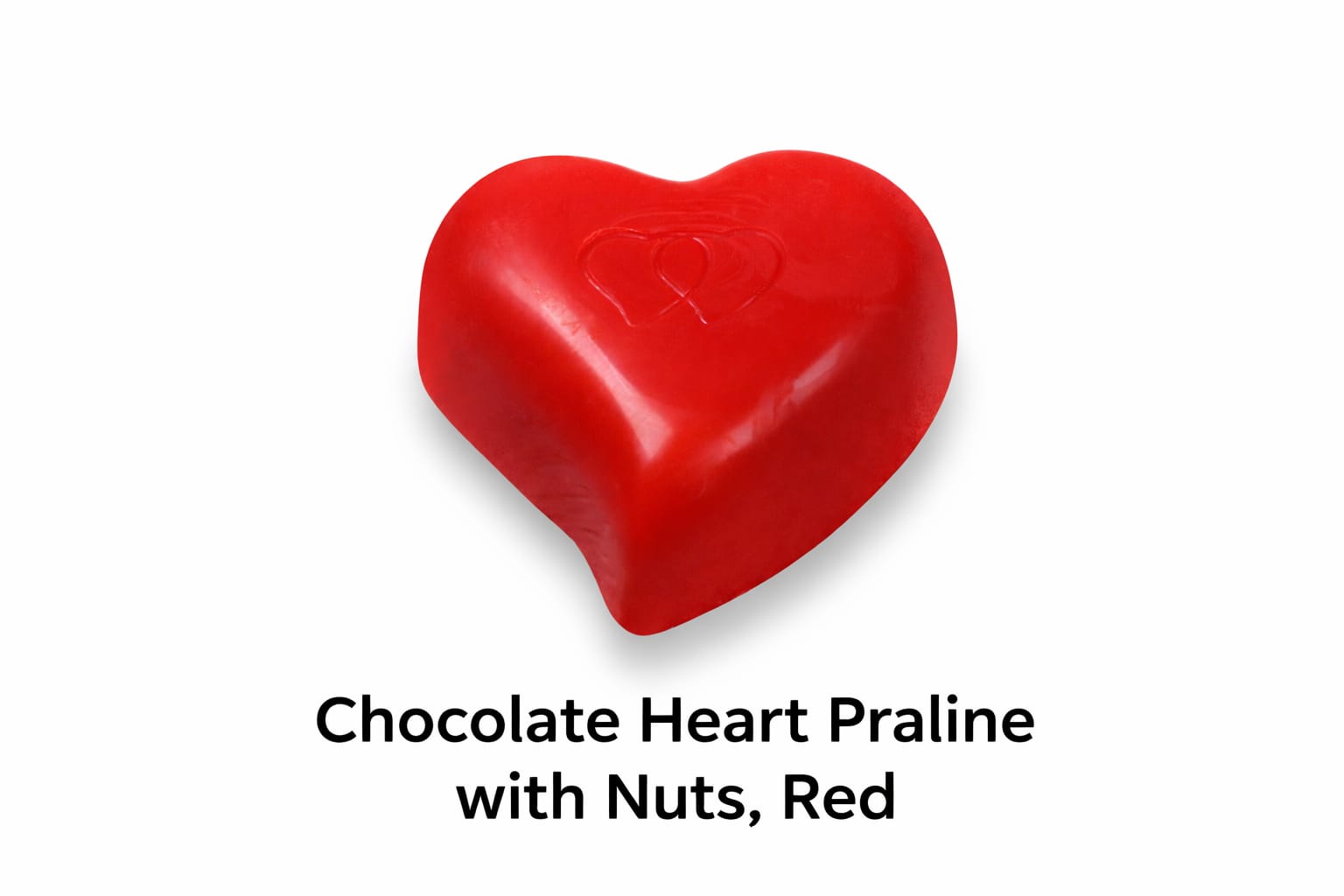 Red heart-shaped chocolate praline with nuts on a white background