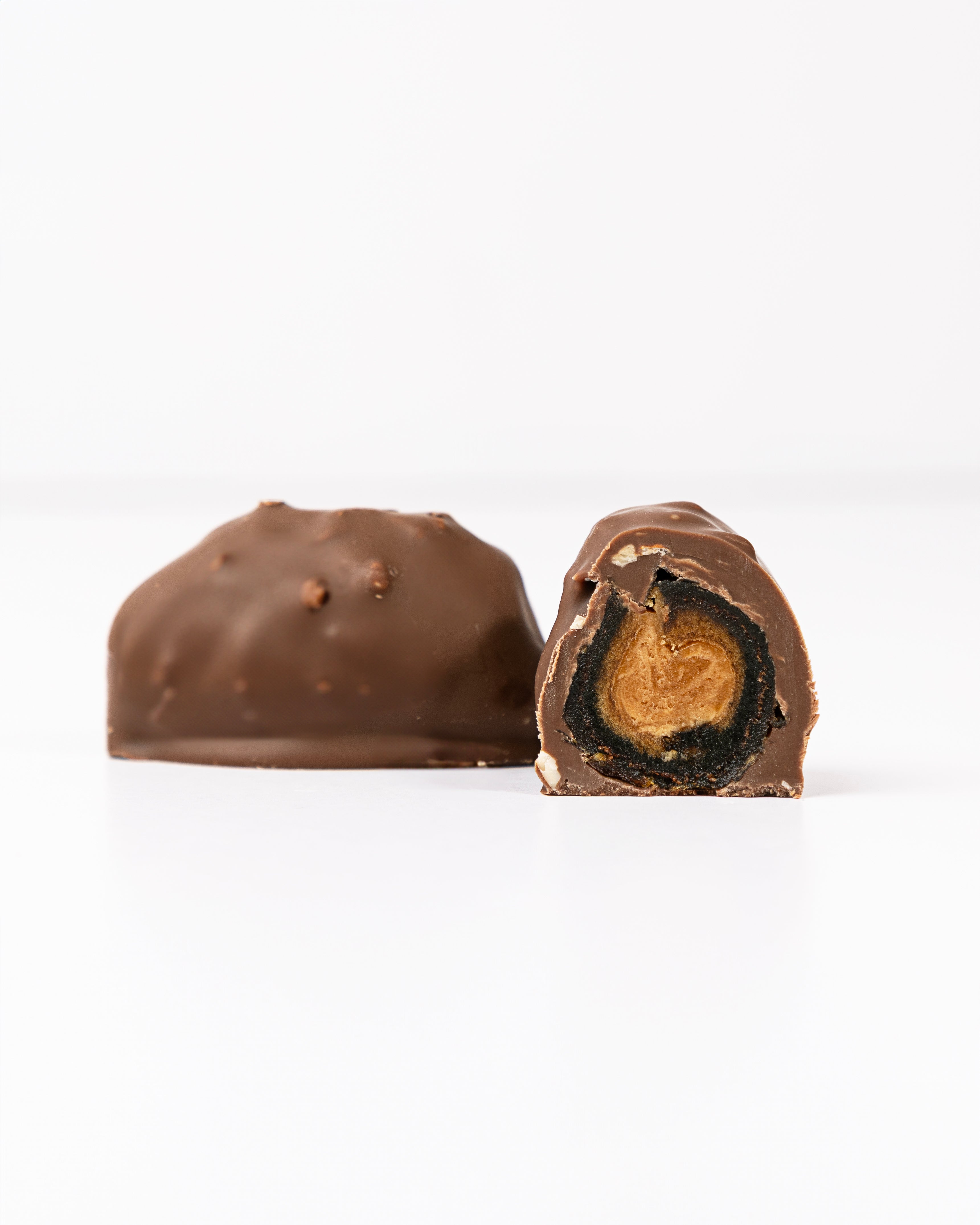 Chocolate Covered Dates with Pistachio Caramel and Lotus